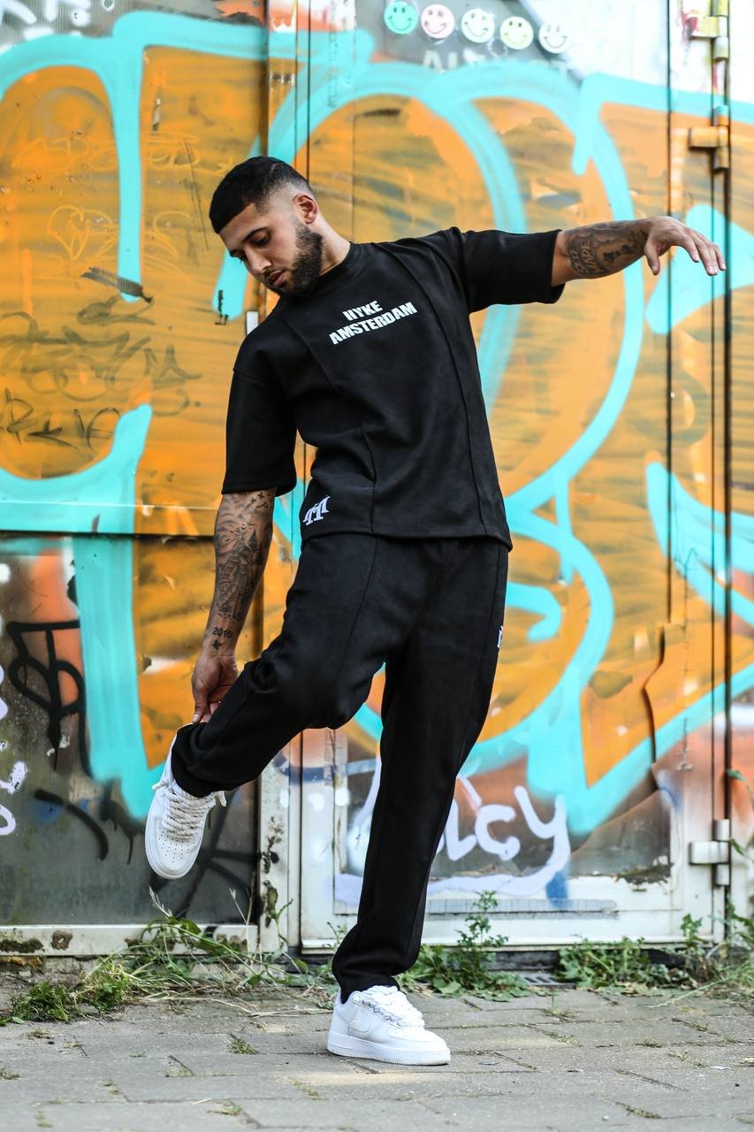 Black tracksuits back