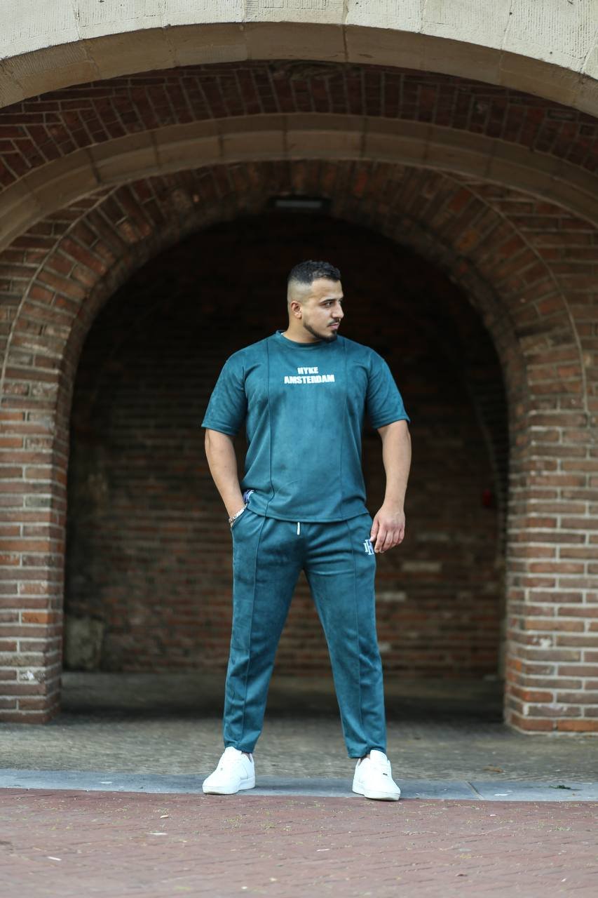 Green tracksuits back